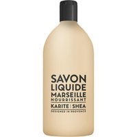 Beige bottle of Compagnie De Provence Liquid Marseille Soap Refill with black cap, labeled "Karite Shea" 1000 ml.