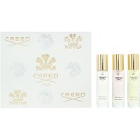 Creed Women's Signature 5-piece gift set with three perfume bottles, gold caps, and white packaging with gold logos.