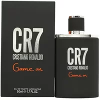 Black CR7 Game On Eau De Toilette 50ml bottle with silver cap, bold white logo, and matching black box with red accents.