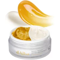 d'Alba White Truffle Double Serum & Cream in a clear jar, featuring dual gold and white creamy textures.