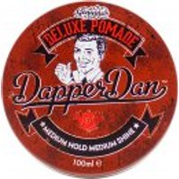 Red tin of Dapper Dan Deluxe Pomade, 100ml, featuring vintage-style illustration and text for medium hold and shine.