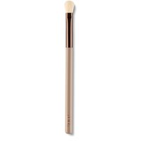 Delilah vegan eyeshadow brush with beige handle and soft white bristles, featuring a sleek metallic ferrule.
