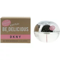 Round silver DKNY Be Delicious Extra Eau De Parfum bottle beside brown and pink box, 50ml size.