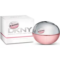 Round pink and silver DKNY Be Delicious Fresh Blossom Eau De Parfum bottle with matching white box.