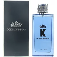 Blue Dolce & Gabbana K Eau De Parfum bottle with crown cap, next to black box with silver logo.