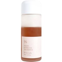 Frosted bottle of Dr. Ceuracle Vegan Kombucha Tea Essence with white cap and label, containing brown liquid.