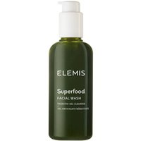 Green bottle of Elemis Superfood Facial Wash with white pump and text, featuring nutrient-rich cleanser.