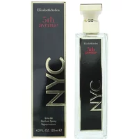 Clear glass bottle with gold cap, black label with gold "NYC" text, next to matching black and gold box.