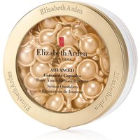 Gold jar of Elizabeth Arden Advanced Ceramide Capsules with clear lid showing pearl-like serum capsules inside.