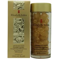 Elizabeth Arden serum with gold capsules in a clear bottle, next to a matching gold box with elegant branding.