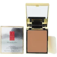 Gold compact with Elizabeth Arden Flawless Finish cream makeup in Cognac Cream, includes mirror and sponge.