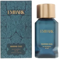 Blue Embark Marine Oud Eau De Parfum bottle with gold cap, ornate box with embossed pattern.