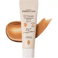 Embryolisse CC Cream+ SPF 20 Gold 30ml, beige tube with black text, cream swatch in background.