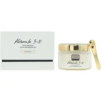 Erno Laszlo Phormula 3-10 cream in white jar with gold lid, black text, and matching box with gold spatula.