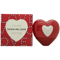 Red heart-shaped Escada Show Me Love Eau De Parfum bottle with matching box featuring white text and heart design.