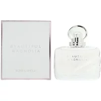 Clear glass bottle of Estée Lauder Beautiful Magnolia Eau De Parfum 50ml with silver cap, next to matching box.