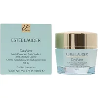 Estée Lauder DayWear cream jar with gold lid, light blue label, next to matching box, 50ml size, SPF 15 for dry skin.