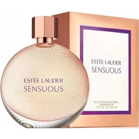 Round Estée Lauder Sensuous Eau De Parfum bottle with textured glass and peach cap, next to matching box.