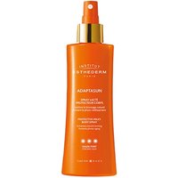 Orange Esthederm body spray bottle with gold cap, labeled "Adaptasun" for high sun protection, 150 ml size.