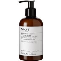 Brown bottle with black pump, white label reading "Evolve Organic Beauty African Orange Aromatic Wash 250ml."