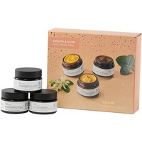Evolve Organic Beauty Smooth & Glow set with three jars, black lids, and peach box with floral design.