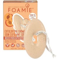 Exfoliating body bar with apricot seeds, oval shape, peach color, with a white string, FOAMIE packaging in background.