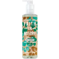 Clear bottle of Faith in Nature Coconut Dog Shampoo with pump, green and brown leaf design, 400ml.
