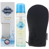 Fake Bake Tanning Water Gift Set with blue-capped bottle and black application mitt, 198ml.