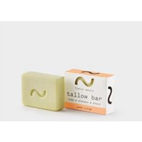 Fierce Nature tallow bar, light green with embossed wave, next to white and orange packaging, 80g scented.