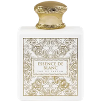 White French Avenue Essence De Blanc perfume bottle with ornate gold cap and intricate gold label design.