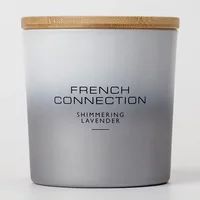 Silver French Connection candle with wooden lid, labeled "Shimmering Lavender," part of the Metallic Collection.