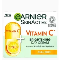 Garnier Vitamin C Brightening Day Cream 50ml, white jar with citrus imagery and green Garnier logo.
