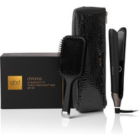 Black ghd 2-in-1 hair dryer brush with sleek design, textured black case, and matching paddle brush.