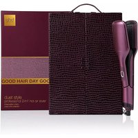 Purple ghd 2-in-1 hot air styler with sleek design, paired with textured dark case and branded packaging.