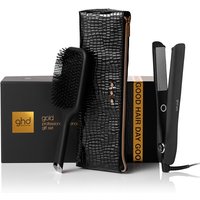 Black GHD hair straighteners with paddle brush, textured black case, and gold-accented packaging.