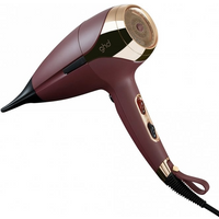 Plum ghd helios professional hair dryer with gold accents and ergonomic handle