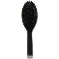 Black GHD oval dressing brush with nylon bristles and sleek handle with silver end cap.
