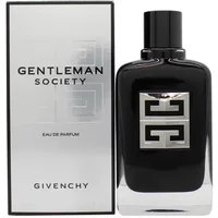 Black Givenchy Gentleman Society Eau De Parfum bottle with silver logo, next to matching silver and black box.