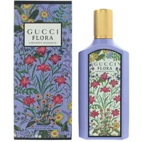 Gucci Flora Gorgeous Magnolia Eau De Parfum 100ml in purple bottle with floral design and gold cap.