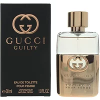 Gucci Guilty Pour Femme Eau De Toilette 30ml, gold and clear bottle with logo, next to black packaging.