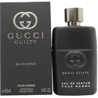 Black Gucci Guilty Pour Homme Eau De Parfum 50ml bottle with silver cap and matching black box.