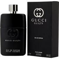 Black Gucci Guilty Pour Homme Eau De Parfum bottle with silver cap, next to matching black box with logo.
