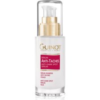 Guinot Anti-Taches Serum 25ml in clear pump bottle with gold accents and red label.