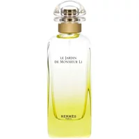Clear glass bottle with yellow gradient, gold cap, labeled "Hermès Jardin De Monsieur Li Eau De Toilette 100ml".