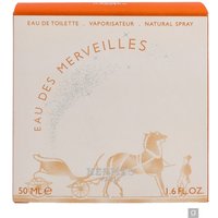 Hermes Eau Des Merveilles 50ml spray in a round, clear bottle with orange accents and a horse carriage design.