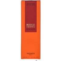Orange and red Hermes Rouge Eau de Toilette 100ml box with bold white text and elegant design.