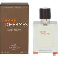 Clear glass bottle with black cap, orange text "Terre D'Hermes," next to brown box labeled "Hermes Eau de Toilette 50ml."
