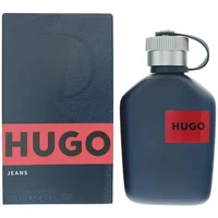 Dark blue Hugo Boss Jeans Eau De Toilette bottle with silver cap and red label, next to matching box.