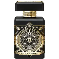 Black and gold Initio Oud for Greatness perfume bottle with intricate geometric design and eye motif.