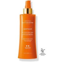 Orange bottle of Institut Esthederm Adaptasun Body Lotion with gold pump and white text, 200ml size.